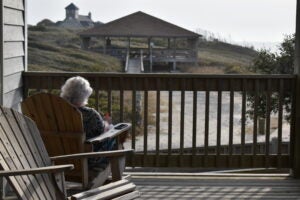 Relaxing on the beach house deck